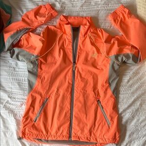 New Balance Neon Orange Women's Running Jacket with Reflective Trim